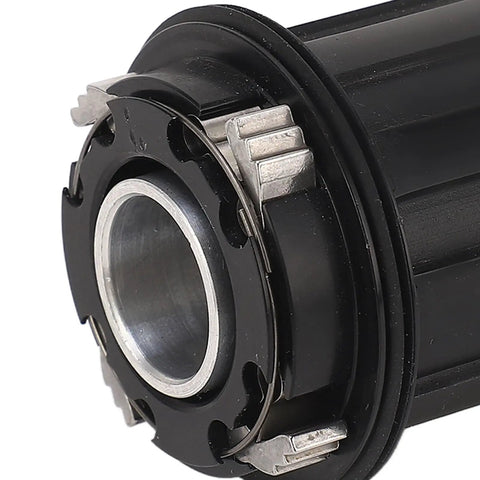 Close-up of Beefy 11 Speed Bike Freehub Body for HG Flywheel with 15mm thru axle, showing metal bearings and claw design.
