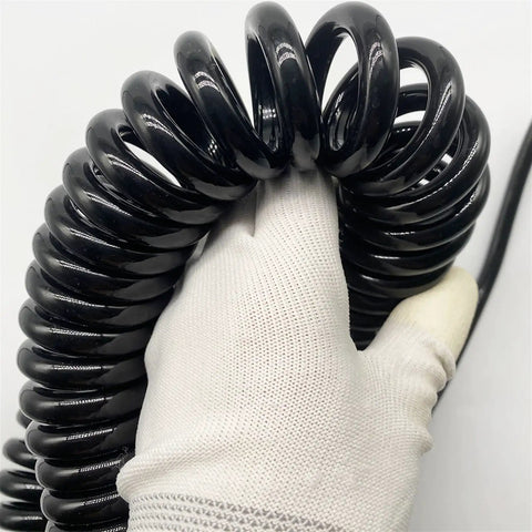 Tough As Nails Coiled Extension Cord With 6 Meter Extra Reach, Heavy Duty 4 Core Pure Copper Spiral Power Cable in hand.
