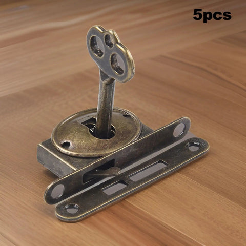 Set Of Five Antique Furniture Locks For Cabinets And Drawers With Old School Vibe, vintage lock and key on wooden surface.