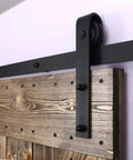 Antique Style Wood Barn Door Hardware Flat Rollers Hangers Black Finish No Sliding Rail installed on rustic wooden door