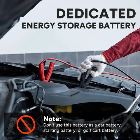 Person holding cables for Heavy-Duty 12V 100Ah LiFePO4 Deep Cycle Battery With 100A BMS For Trolling Motors, RVs, Solar And Off Grid Power