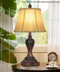 Set Of 2 Touch Control 3-Way Dimmable Bedside Lamps With Two USB Charging Ports Bell Shape Faux Silk Shade Brown Base LED Bulbs Included Ideal For Nightstands Bedroom Or Living Room No-Fuss Easy Tap Dimmer, shown on a wooden table with clock and plant, dimensions highlighted