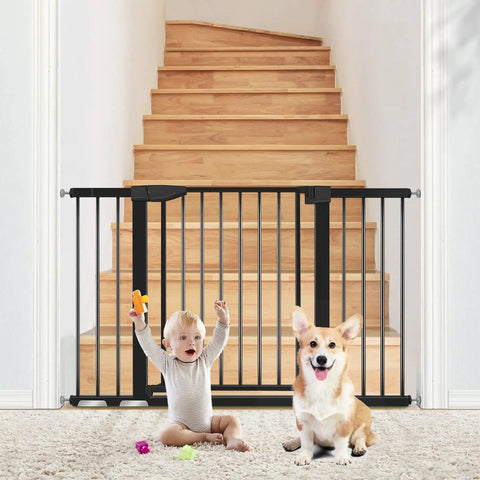 Extra Wide Baby Gate For Doorways 29.93 To 51.5 Inches, 30-Inch High With Auto-Close Walk-Thru Door blocking stairs with baby and dog in front