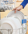 Stainless Steel Colander 3 Quart Strainer For Kitchen Food Prep Dishwasher Safe being placed in a dishwasher rack