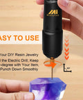 Pro Grade Electric Resin Drill Set Pin Vise Mini Hand Drill Kit with 10 Twist Drill Bits shown drilling a resin piece