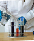 Top Tier Assorted High Temp Silicone Rubber Tapered Plug Kit With 8 Sizes For Caulking Tubes Sealing Caps Plus Flasks Test Tubes Tanks And Bottles That Stand Up To Serious Heat And Work Like A Champ. Lab test tubes with blue silicone tapered plug and liquid samples