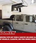 Overhead Truck Cap Garage Hoist With Self-Leveling Lift Safe Anti-Drop System One-Person Operation shown lifting a vehicle hardtop