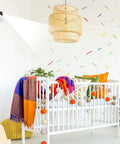 4 Pack Adhesive Wall Mounts for security cameras in a colorful bedroom with crib and decor