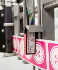 Heavy Duty Compact Modular Label Applicator Built Tough For Relentless Shifts Runs Smooth, sensor and label alignment close-up.