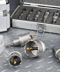 Badass Twelve Piece Tct Carbide Hole Saw Kit Spanning Thirteen To Fifty Four Millimeters With Titanium Coated Teeth for precision cutting.