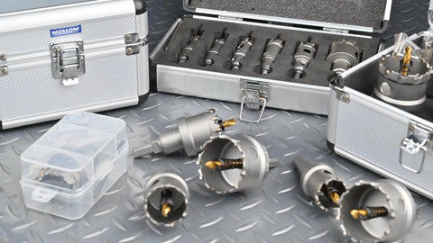 Badass Twelve Piece Tct Carbide Hole Saw Kit Spanning Thirteen To Fifty Four Millimeters With Titanium Coated Teeth for precision cutting.