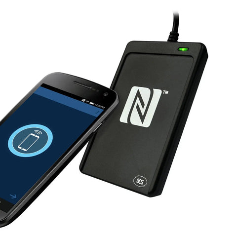 USB NFC Go To Reader And Writer For Windows Mac Linux with PC linked peer-to-peer, black, alongside smartphone.