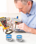 Person using 63-37 Tin Lead Rosin Core Solder Wire for Electrical Soldering, 0.8mm Diameter, 50g Spool, on a circuit board