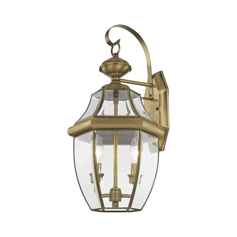 Monterey Two Light Outdoor Antique Brass Finish Solid Brass Wall Lantern With Clear Beveled Glass