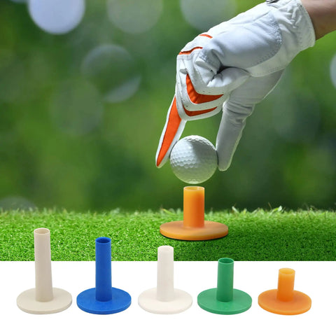 Golf Rubber Tees Practice Set With Mixed Size Tees In 5 Colors for Indoor Outdoor Use, shown with glove and ball on orange tee.