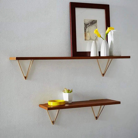 Built Tough Hidden Triangle Wall Shelf Brackets Rock Solid Heavy Duty Floating Bracket Kit For Diy Bookshelf Storage And Clean Modern Home Decor Upgrade Two Piece Black Metal with wooden shelves and decor.