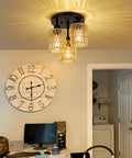 Installed Three Light Boho Rattan Ceiling Fixture with Hand Woven Cage Shade in room, provides warm glow, semi flush mount.