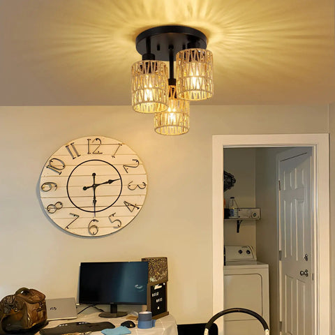 Installed Three Light Boho Rattan Ceiling Fixture with Hand Woven Cage Shade in room, provides warm glow, semi flush mount.