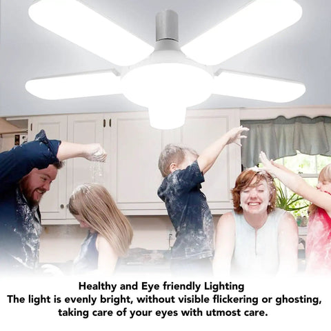 LED Garage Light With Five Adjustable Panels, 100W 8000LM Deformable Ceiling Light illuminating a family in a kitchen.