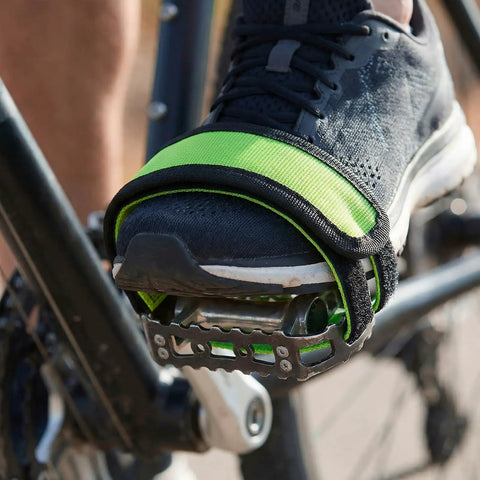 Foot secured in bike pedal using Two Pack Green Bike Pedal Straps For Stationary Bikes Anti Slip Foot Straps Toe Clips scenario