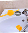 Pipe threading tools from Hardcore Pipe Threader Kit For Plumbing Projects placed on sink with wrench and hoses, ready for use.