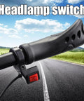 Handlebar Headlight On Off Push Button Switch For Motorcycles And Electric Bikes on bike handle in scenic background