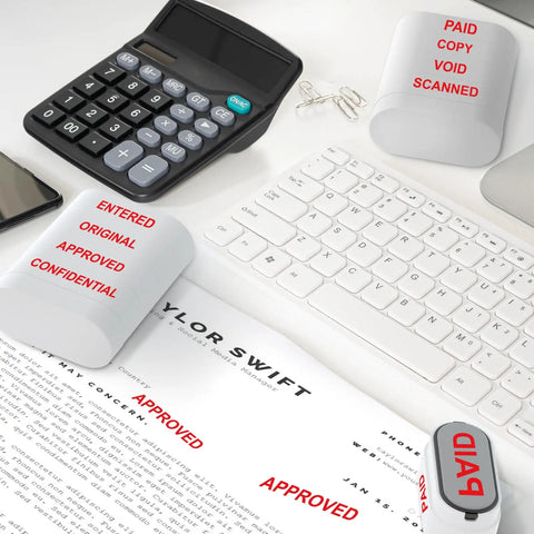 Solid Workhorse Eight In One Self Inking Office Stamp Set For Paid Copy Void Scanned Entered Original Approved Confidential Documents on desk.