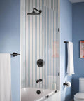 Arris 18 Inch Modern Single Towel Bar Matte Black For Bathroom And Kitchen Use on a blue bathroom wall near shower