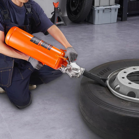 Person using All Purpose Tire Seater And Inflator Tool 8 L Portable Air Blaster with 120 PSI Max on truck tire