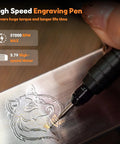 Close-up of Heavy Duty 37000 RPM Cordless Engraving Pen carving a detailed wolf design on metal surface.