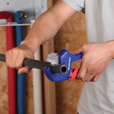 Person using Built Tough Ratchet Pipe Cutter For PEX PVC PPR And Plastic Hoses Up To One And Five Eighths Inches With An Aluminum Die Cast Body