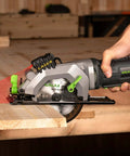 Side view of GALAX PRO 4-1/2in circular saw with laser guide cutting wood.
