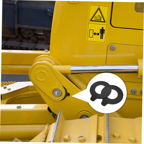 Heavy Duty Rubber Washer Kit For Excavator Boom Bushing Two Pack showing rubber pads in excavator joint area.