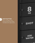 Close-up view of the two oz shot button on the Barista Style Single Serve Coffee Maker With Built In Milk Frother For Hot Or Iced Lattes And Cappuccinos, Three Brew Sizes, Two Oz Shot Button, Works With Any K Cup Pod, Black.