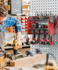 Heavy Duty Wall Mount Power Tool Organizer With Charging Station, Red drill storage on pegboard in workshop, size shown.