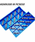 High Performance Carbide Grooving Insert PC9030 MGMN300‑M in a blue case, perfect for CNC lathe parting operations.