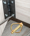 Image showing Heavy Duty Linch Pin Lock Shaft Fastener Secures Tractor Trailer Axles With Reliable Spring Loaded Action Made From Durable Carbon Steel And Golden Finish For Industrial Jobs And Heavy Work.