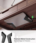 Heavy Duty Under Desk Laptop Mount And Wall Holder Adjustable Metal Bracket secures laptop with rounded edges, under a wooden desk.