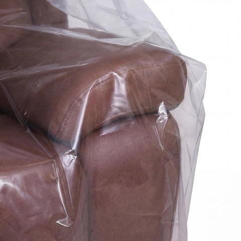 Dust Proof Moving Bag For Sofa And Boxes Clear 4Mil Virgin Plastic Odorless Heavy Duty Furniture Cover on brown armchair corner