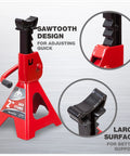 Two red low-profile 2-ton Jack Boss jack stands with black serrated lifting posts for cars, Amazon brand.