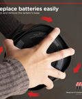 Person replacing batteries in Beefy 800 Lumen LED Camping Lantern With USB Rechargeable Battery 200 Hour Runtime Carabiner Handle Emergency Light