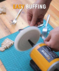 Pro Grade Heavy Duty Bench Buffer Polisher With Variable Speed Control in use buffing wooden pieces on a work surface.