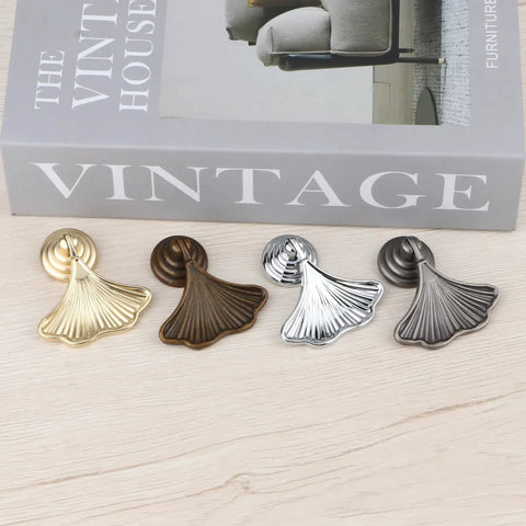 Fresh Ginkgo Leaf Drawer Pulls Set Of Four Dope Copper Dresser Knobs For Cabinets And Drawers in gold, bronze, silver, and black finishes.