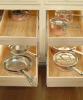 Premium Two Tier Pull Out Cabinet Organizer Featuring Ball Bearings And Smooth Glide Slide Out Drawer For No Sweat Assembly Tons Of Room Under Counter Kitchen Pantry Storage Solution Fits 17 Wide with pots and pans in drawers.