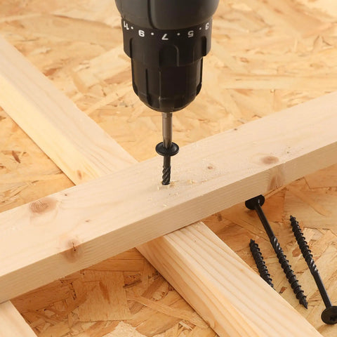 2 Inch Lag Screws Set For Outdoor Wood Projects, 57 Pieces, 1 Pound, Structural Screws in use with drill on wood panel