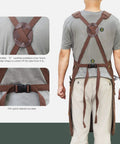 Back view of a person wearing Woodworking Apron With 9 Tool Pockets And Magnetic Chest Holders, showing soft shoulder straps.