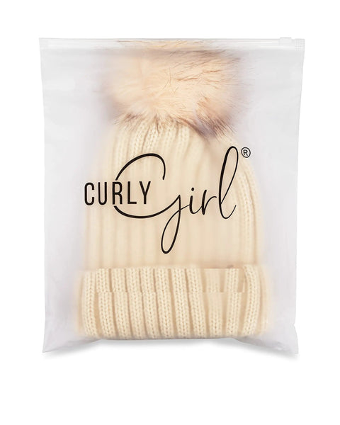 Satin Lined Beanie With Pom For Women That Keeps Curls Frizz Free in transparent packaging with Curly Girl inscription.