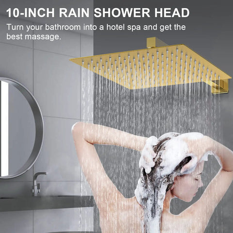 Brushed Gold 10 Inch Shower System With Rain Shower Head and handheld spray in use, mounted on bathroom wall.