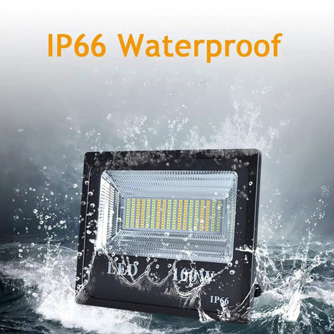 100W Led Solar Flood Lights Outdoor Dusk to Dawn Solar Lights 12000Lm, IP66 waterproof floodlight with splashing water effect.