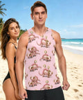 Mens Pink Sleeveless Tank Top With Concealed Pocket And Bold Mechanical Lizard Clock Graphics And Moisture Wicking Mesh Athletic Tee on a beach.